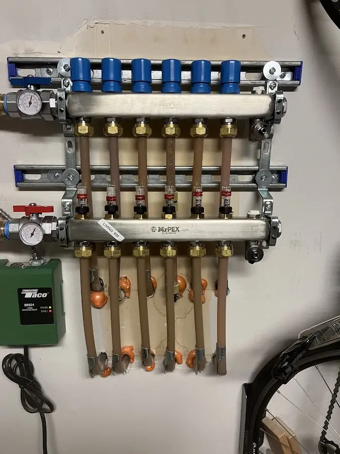 Plumber performing Gas Leak Detection at a residential property in Hebron